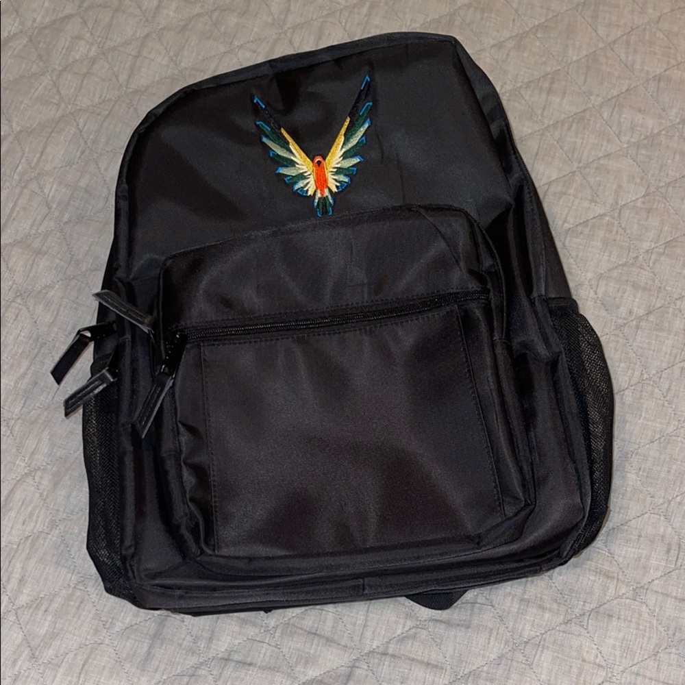 Black and Blue Backpack with Colorful Design